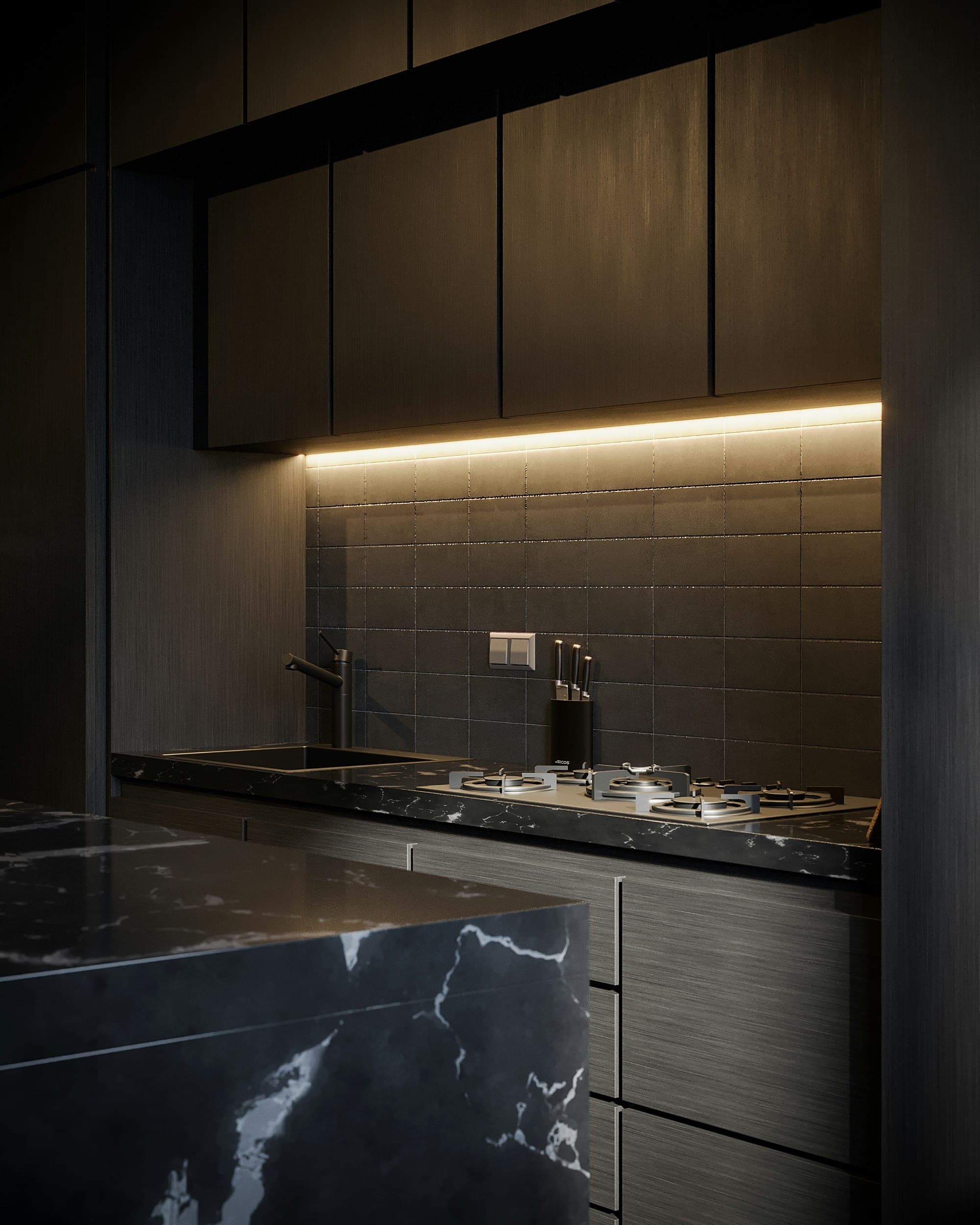 A graphite kitchen with concealed task lighting and stone surfaces